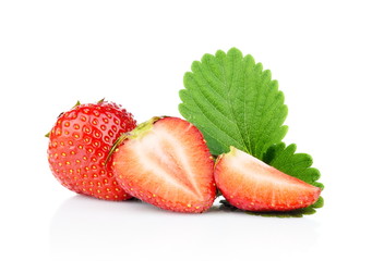 Several sliced strawberries with leaf isolated