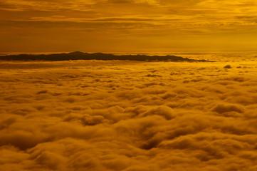 Beautiful sunset cloud and hill above
