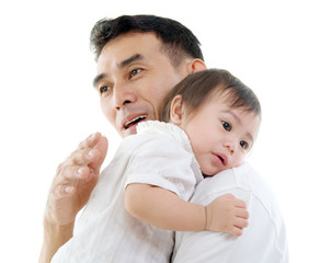 Father comforting an upset child