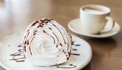 Rolled of cone thin pancakes with sweet cream