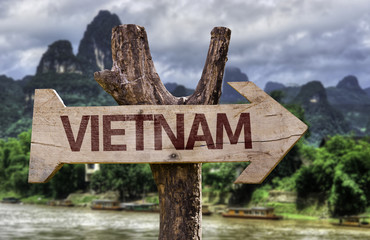 Vietnam wooden sign with agricultural background