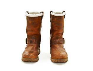 Pair of brown winter boots. Isolated on white background