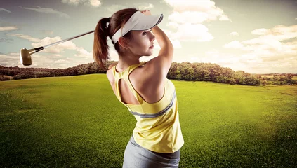 Poster Woman golf player swinging with golf club © Stasique