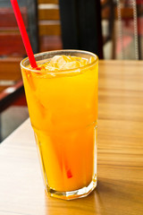 Orange juice with ice  in a glass place on the table