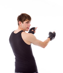 model isolated on plain background looking at camera pointing