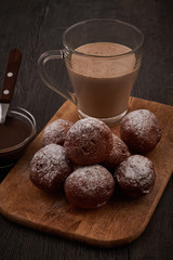 Baked doughnuts with glass of cappucino