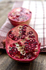 pomegranate fruit on wooden background