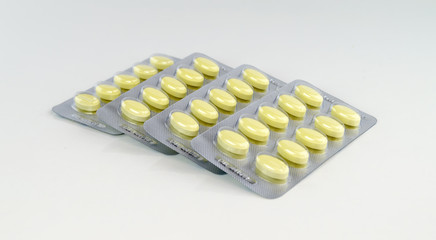 pills in a foil blister package , blister