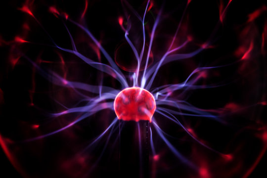 Plasma ball with colorful blots, abstract background.