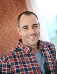 Obraz premium Portrait of cheerful student guy