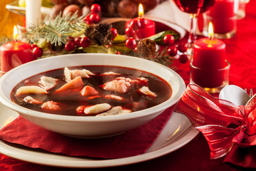 Christmas red borscht with meat filled dumplings - obrazy, fototapety, plakaty