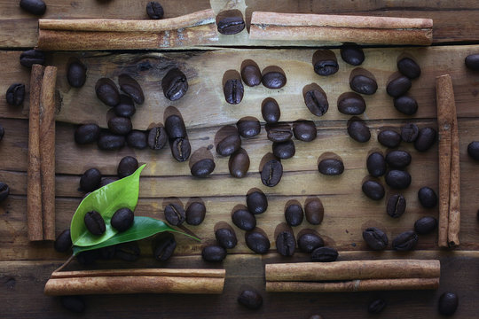 wooden background coffee grains