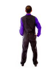 model isolated on plain background back hands on hips