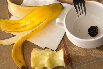 table remnants after a consumed healthy breakfast