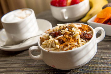 cappuccino and nutritious oatmeal breakfast