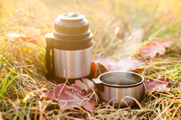 Vacuum flask and cup