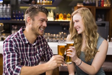 Young couple having a drink together