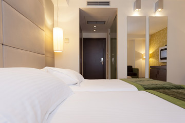 Modern hotel bedroom interior 