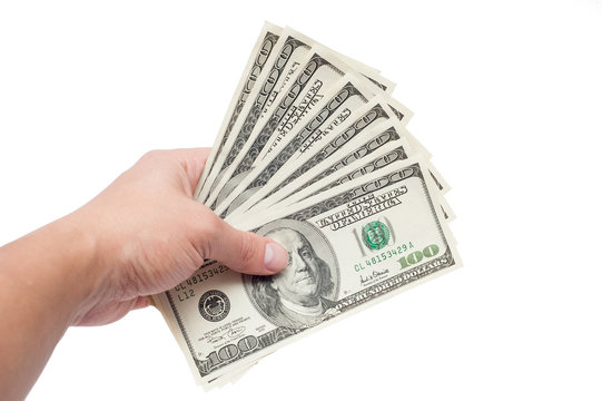 hand with dollars isolated on a white background