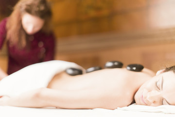 Obraz na płótnie Canvas Hot stone massage therapy