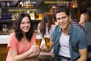 Young couple having a drink together