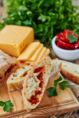 Fresh bread ciabatta with sun dried tomatoes
