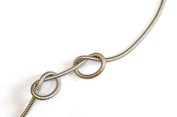 flexible metal hose with two knots