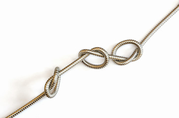flexible metal hose with three knots