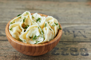 Meat dumplings. Russian traditional pelmeni with meat