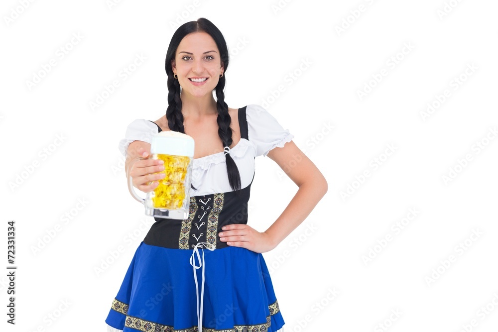 Wall mural Pretty oktoberfest girl holding beer tankard