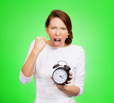 Angry woman boss with alarm clock screaming pressured by time