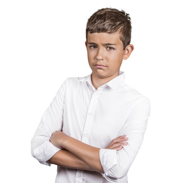 teenager boy looking skeptically at you on white background 