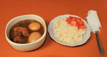 Pork stewed and egg in the gravy with rice and kimchi