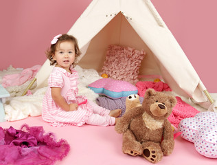 Fototapeta premium Pretend Play Tea Party at home with a TeePee Tent