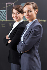 Elegant businesswomen working in office