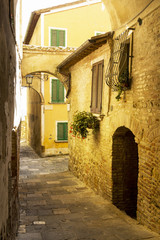 Old vintage street in an Italian village in Tuscany