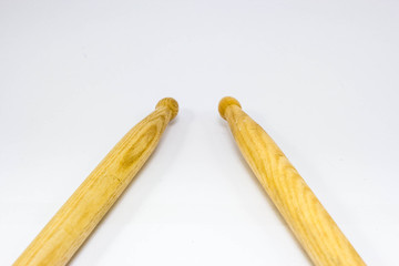 One pair of drum sticks on white  background