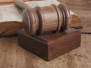 Wooden gavel and books