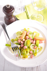 leek cooked with carrot and bacon
