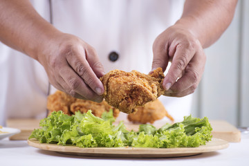 chef cook preparing fried chicken