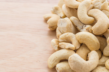 cashew on wood background