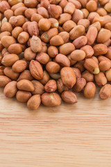 peanuts on wood background