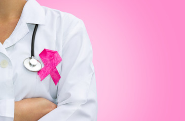 female doctor with pink breast cancer awareness ribbon