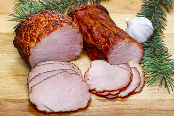 Sliced ham on wooden table