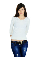 Obraz premium young woman in jeans and blouse posing on white background