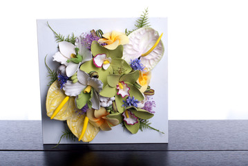 bouquet of flowers on a brown desk with isolated background