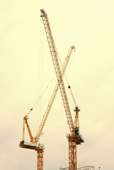 Two cranes at construction site