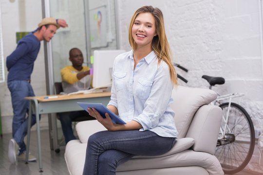 Casual woman using digital tablet