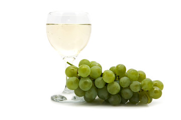 glass of wine and cluster of vine