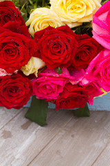 red and pink  roses  on table